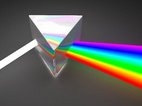 Een prisma breekt wit licht maakt alle kleuren licht zichtbaar. Dezelfde kleuren zijn ook in aura's te zien. 